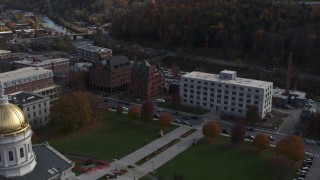 DX0002_219_009 - 5.7K aerial stock footage of orbiting a government office building in Montpelier, Vermont
