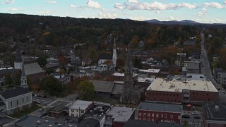 DX0002_219_035 - 5.7K aerial stock footage approach church steeples and downtown buildings, Montpelier, Vermont