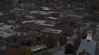DX0002_219_039 - 5.7K aerial stock footage of orbiting Asiana House and downtown buildings, Montpelier, Vermont