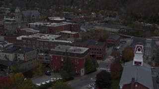 DX0002_219_040 - 5.7K aerial stock footage of circling Asiana House and downtown buildings, Montpelier, Vermont