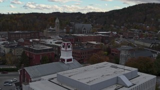 DX0002_219_046 - 5.7K aerial stock footage fly over US Postal Service building to approach city hall in downtown, Montpelier, Vermont
