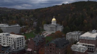 DX0002_219_051 - 5.7K aerial stock footage of flying away from the capitol building and buildings around the grounds, Montpelier, Vermont