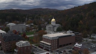 DX0002_219_052 - 5.7K aerial stock footage of flying toward and orbiting the capitol building and buildings around the grounds, Montpelier, Vermont