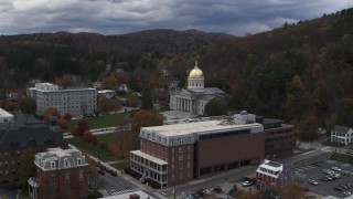 DX0002_219_053 - 5.7K aerial stock footage of a reverse view of the capitol building and buildings around the grounds, Montpelier, Vermont