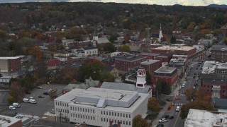 DX0002_219_063 - 5.7K aerial stock footage of orbiting brick buildings and church steeples in downtown, Montpelier, Vermont