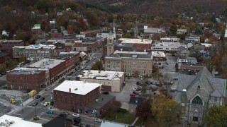 DX0002_220_004 - 5.7K aerial stock footage a stationary view of city hall at sunset, Montpelier, Vermont