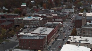 DX0002_220_031 - 5.7K aerial stock footage of flying by Union Block buildings, Main Street, and city hall at sunset, Montpelier, Vermont