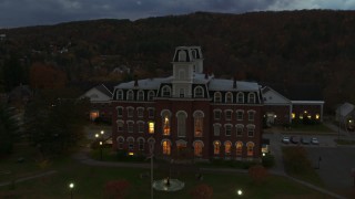 DX0002_220_045 - 5.7K aerial stock footage of orbiting the Vermont College of Fine Arts at twilight, Montpelier, Vermont