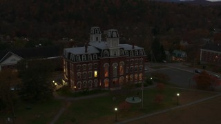 DX0002_220_050 - 5.7K aerial stock footage fly away from the Vermont College of Fine Arts at twilight, Montpelier, Vermont