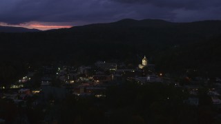 DX0002_220_058 - 5.7K aerial stock footage of the capitol dome lit up at twilight, Montpelier, Vermont