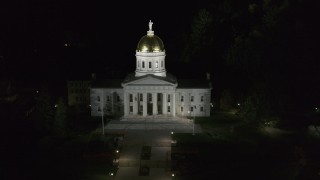 DX0002_221_010 - 5.7K aerial stock footage of the front of the Vermont State Capitol at night, Montpelier, Vermont