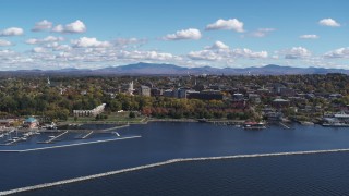DX0002_222_007 - 5.7K stock footage aerial video of the downtown area seen from Lake Champlain breakwaters, Burlington, Vermont