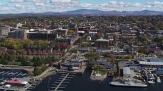 DX0002_222_016 - 5.7K stock footage aerial video of circling downtown, seen from Lake Champlain, Burlington, Vermont