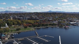 DX0002_222_019 - 5.7K aerial stock footage fly away from downtown, reveal marina on Lake Champlain, Burlington, Vermont