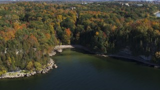 DX0002_223_004 - 5.7K aerial stock footage of a small cove in Lake Champlain, Burlington, Vermont