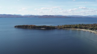 DX0002_223_009 - 5.7K aerial stock footage of a few waterfront homes on Appletree Point by Lake Champlain, Burlington, Vermont