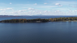 DX0002_223_014 - 5.7K aerial stock footage of passing by lakefront homes on Appletree Point by Lake Champlain, Burlington, Vermont