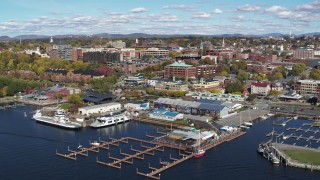 DX0002_224_001 - 5.7K aerial stock footage of city buildings in downtown, seen from Ferry Dock Marina, Burlington, Vermont