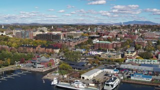 DX0002_224_007 - 5.7K aerial stock footage orbit downtown buildings and marinas, Burlington, Vermont