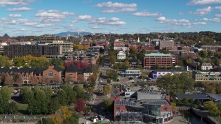 DX0002_224_017 - 5.7K aerial stock footage of city buildings and College Street seen during descent, Burlington, Vermont
