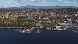 DX0002_224_019 - 5.7K aerial stock footage fly away from marinas and downtown, Burlington, Vermont