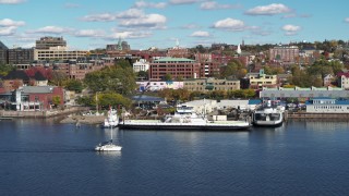 DX0002_224_041 - 5.7K stock footage aerial video a low orbit of office building and marinas in downtown, Burlington, Vermont