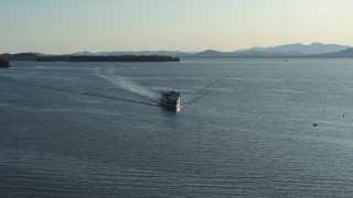 DX0002_224_042 - 5.7K stock footage aerial video tracking a ferry on Lake Champlain near Burlington, Vermont