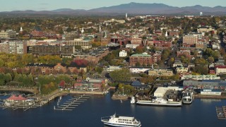 DX0002_224_048 - 5.7K stock footage aerial video of a wide orbit of city building near marinas in downtown, Burlington, Vermont