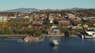 DX0002_224_051 - 5.7K aerial stock footage orbit around city buildings and two marinas in downtown, Burlington, Vermont