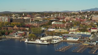 DX0002_224_052 - 5.7K stock footage aerial video orbit around two marinas and city buildings in downtown, Burlington, Vermont
