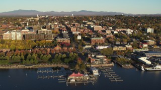 DX0002_224_065 - 5.7K stock footage aerial video of flying away from downtown buildings and marina, Burlington, Vermont