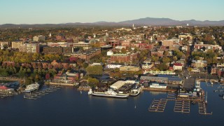 DX0002_224_067 - 5.7K aerial stock footage of a wide orbit of downtown buildings and two marinas, Burlington, Vermont
