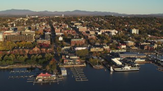 DX0002_224_075 - 5.7K aerial stock footage of downtown's city buildings and marinas during approach to office building, Burlington, Vermont