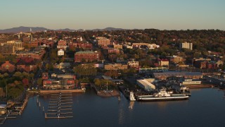 DX0002_225_006 - 5.7K aerial stock footage of buildings in downtown, seen while passing the marinas, Burlington, Vermont