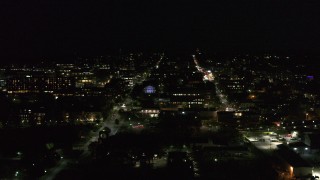 DX0002_226_048 - 5.7K stock footage aerial video of downtown buildings and streets at nighttime, Burlington, Vermont