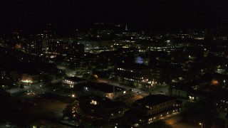 DX0002_226_053 - 5.7K aerial stock footage orbit Battery Street and office buildings in downtown, then fly away at night, Burlington, Vermont