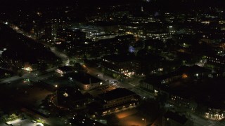 DX0002_226_056 - 5.7K aerial stock footage of office buildings by Battery Street at night, Burlington, Vermont