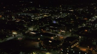 DX0002_226_063 - 5.7K aerial stock footage orbit the downtown area near Battery Street at night, Burlington, Vermont