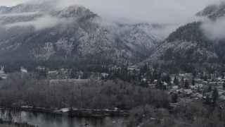 DX0002_227_017 - 5.7K aerial stock footage approach Leavenworth and snowy mountains, Washington