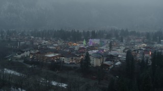 DX0002_227_028 - 5.7K aerial stock footage of orbiting Christmas trees in Leavenworth, Washington