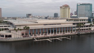 DX0003_229_009 - 5.7K aerial stock footage of orbiting the Tampa Convention Center, Downtown Tampa, Florida