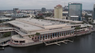 DX0003_229_014 - 5.7K aerial stock footage descend while focused on the convention center, Downtown Tampa, Florida