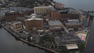 DX0003_229_020 - 5.7K aerial stock footage of a waterfront hospital complex in Tampa, Florida