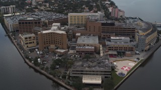 DX0003_229_021 - 5.7K aerial stock footage approach and orbit a waterfront hospital complex in Tampa, Florida