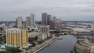 DX0003_229_035 - 5.7K aerial stock footage the city skyline seen from condo complex, Downtown Tampa, Florida