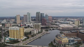 DX0003_229_041 - 5.7K aerial stock footage of flying by the city skyline, seen from the hospital, Downtown Tampa, Florida