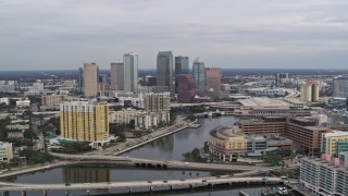 DX0003_229_042 - 5.7K aerial stock footage of flying by the hospital while focused on skyline, Downtown Tampa, Florida