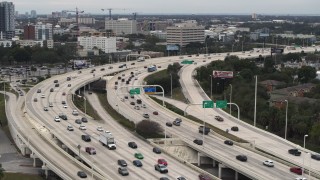 DX0003_230_036 - 5.7K aerial stock footage of heavy freeway traffic in Tampa, Florida