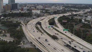 DX0003_231_003 - 5.7K aerial stock footage flyby and away from freeway traffic in Tampa, Florida