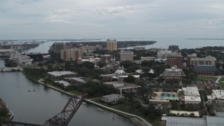 DX0003_231_024 - 5.7K aerial stock footage reverse view of the University of Tampa campus from the river, Florida